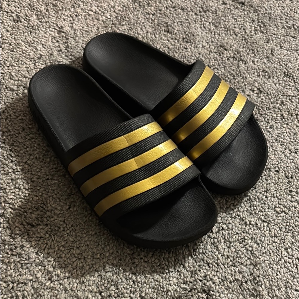 adidas Black Slide Sandals with Metallic Gold Stripes